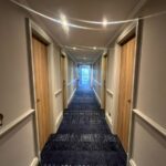 hotel corridor refurbishment with vinyl wrapping