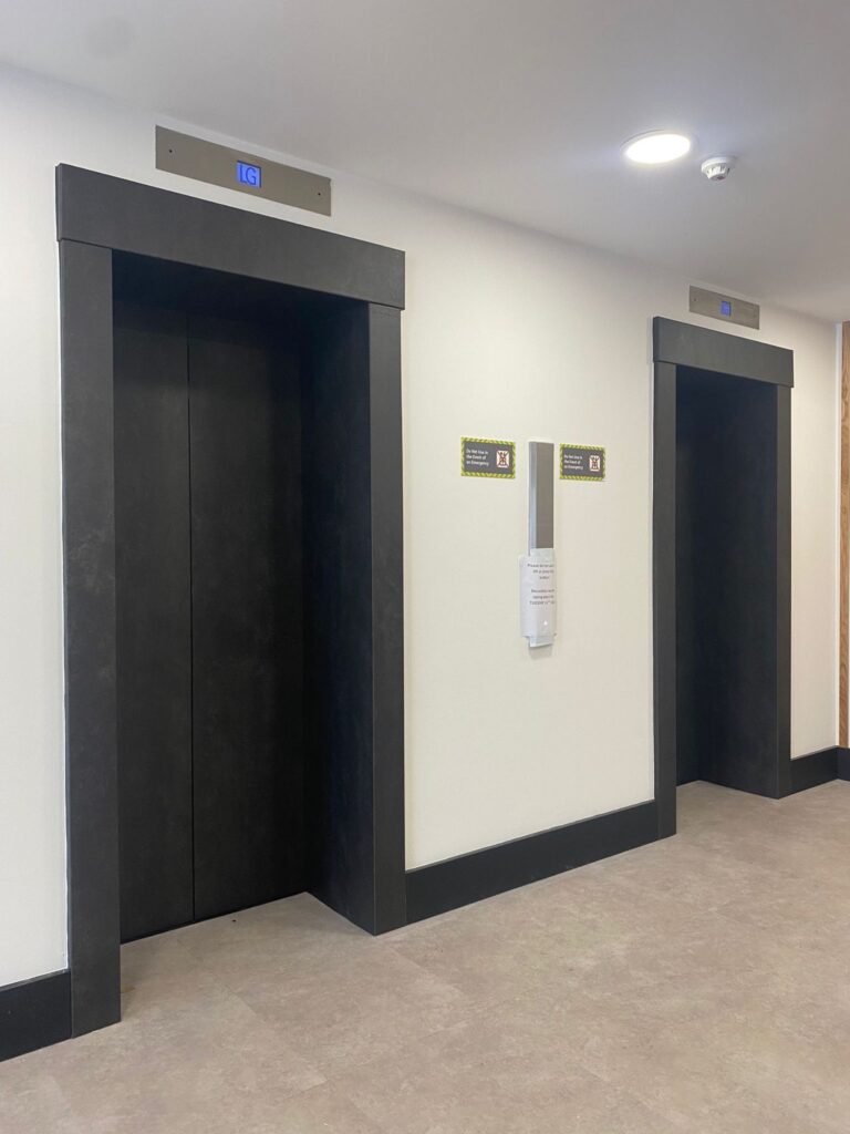 vinyl wrapping of lift exterior doors and reveals