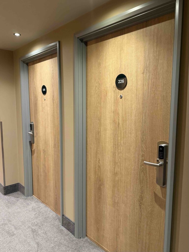 hotel door vinyl wrapping project in ipswich