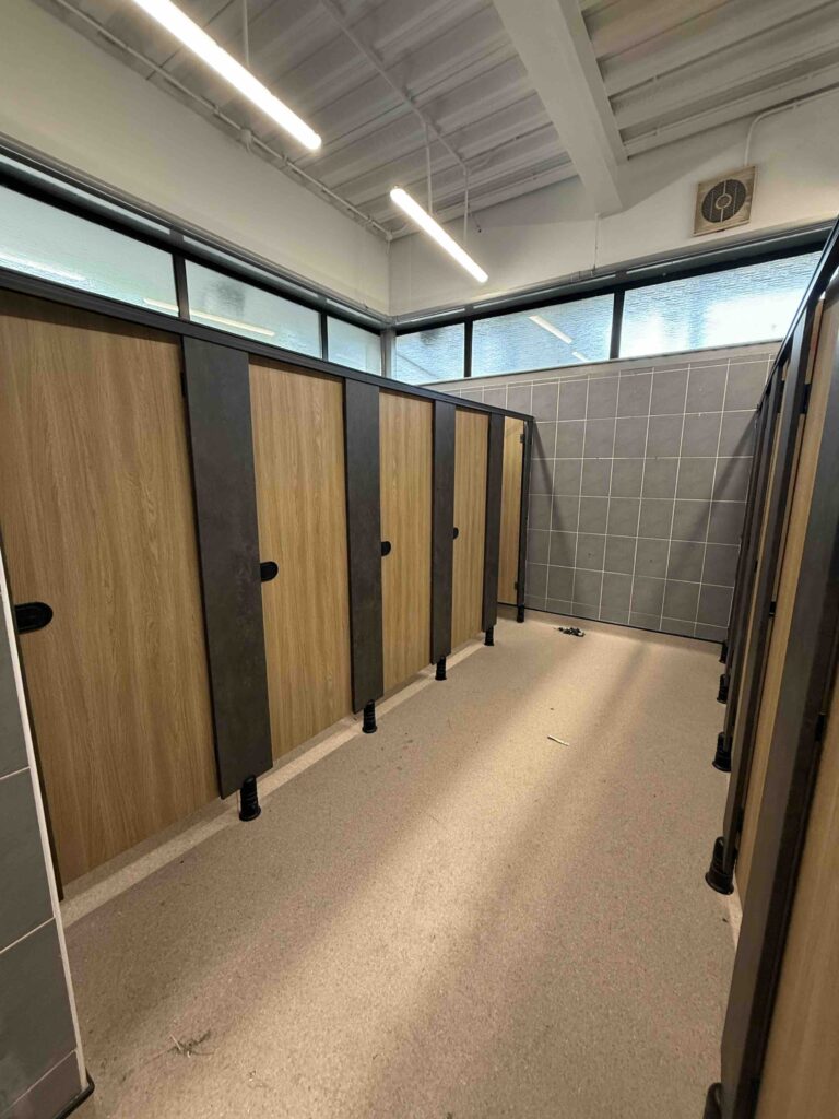 cubicles, vanity units and IPS panels wrapped at Manchester College