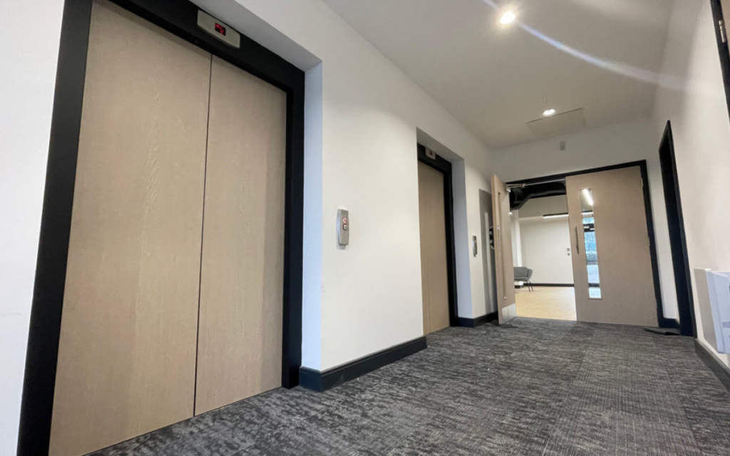 LIFT DOORS, REVEALS AND INTERIORS WRAPPED IN CHESTERFIELD
