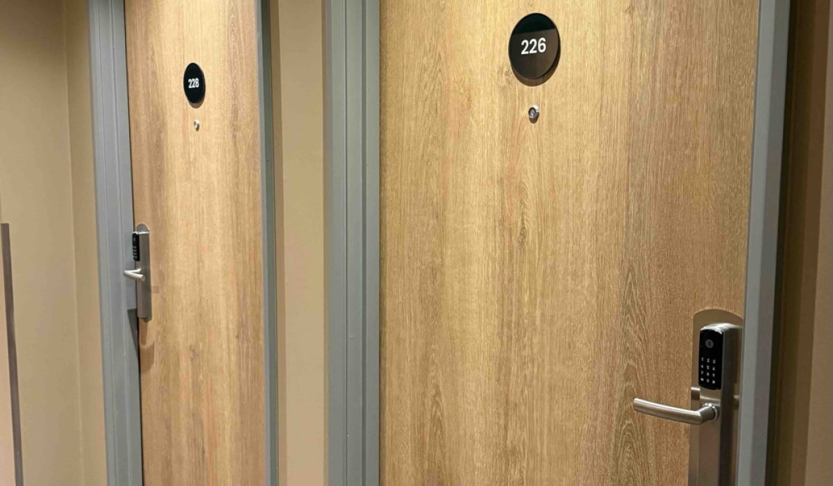 hotel door vinyl wrapping project in ipswich