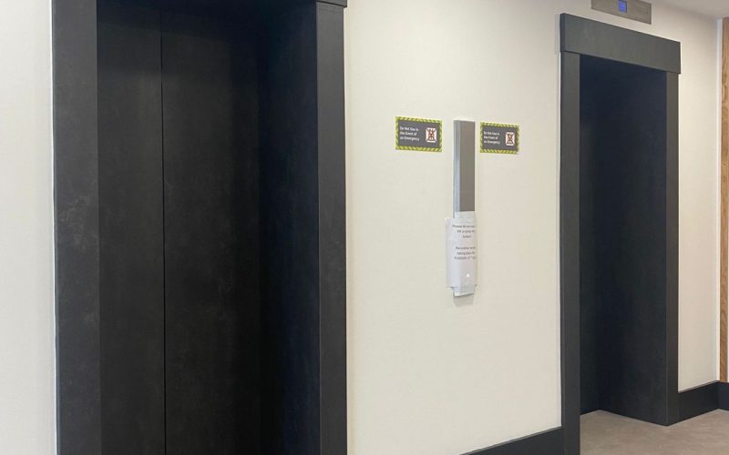 vinyl wrapping of lift exterior doors and reveals